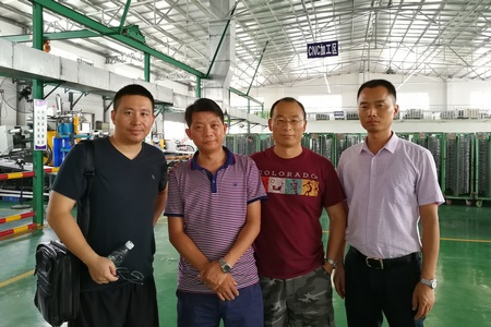 Factory owner and management team